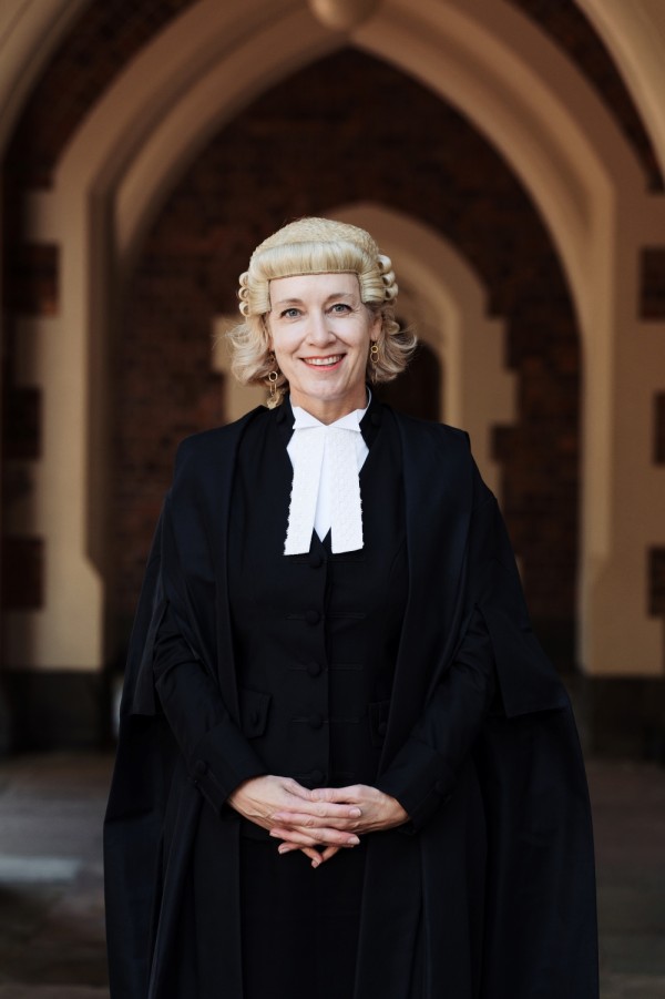 Photo of Anna Adams KC in traditional legal wig and gown